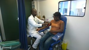 Technician doing a blood sample
